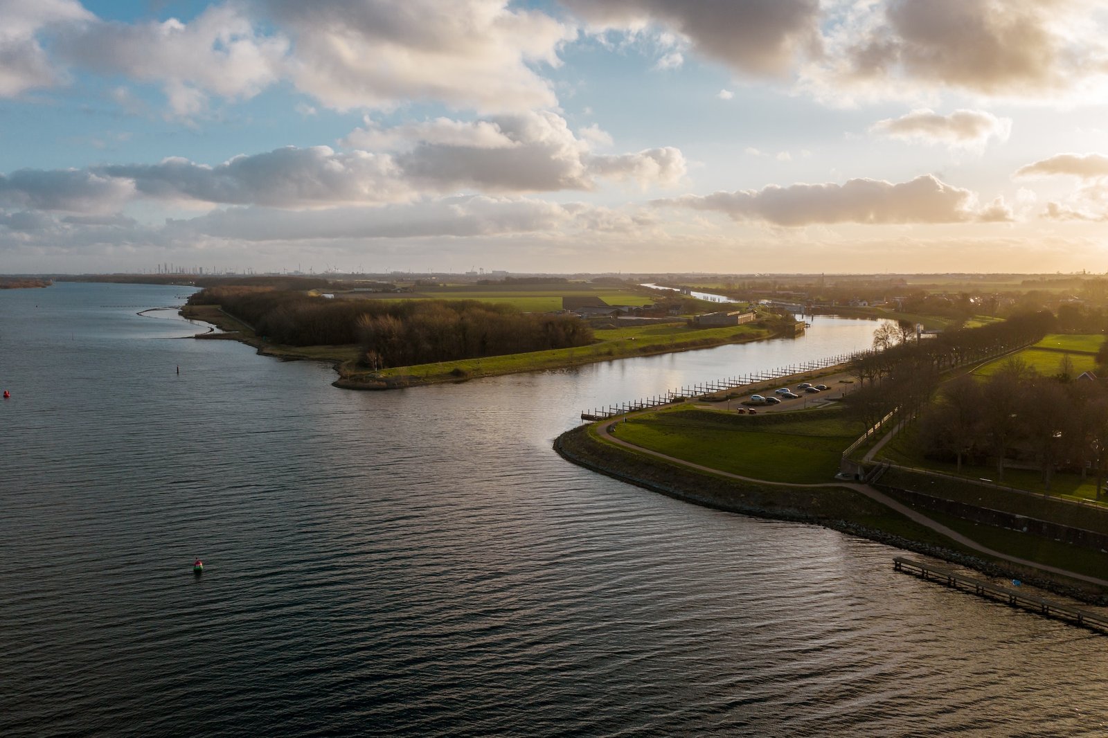 High angle shot of a beautiful river under a cloudy sky in Veere, The Neverlands